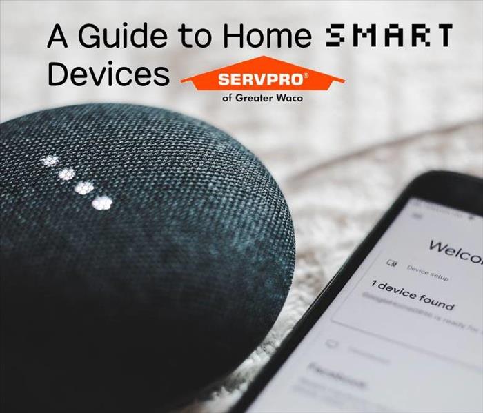 A smart hub and smart phone with the text " A Guide to Home Smart Devices" and the SERVPRO of Greater Waco logo